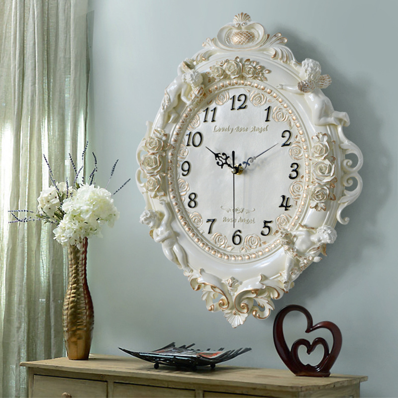 ساعة حائط أوروبية على شكل ملاك - مراجعة Resin Art Wall Clock وسعره