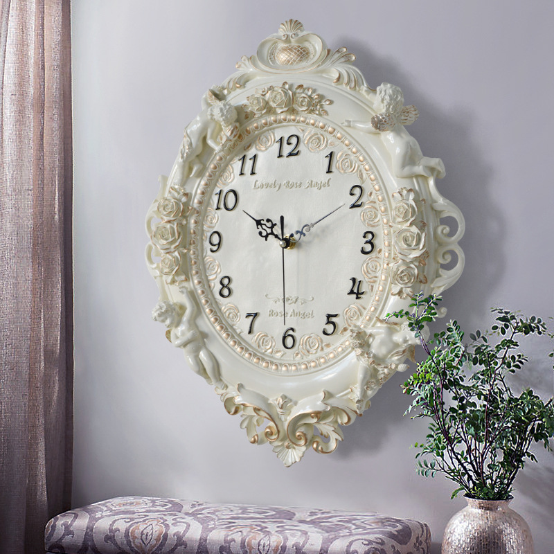 ساعة حائط أوروبية على شكل ملاك - مراجعة Resin Art Wall Clock وسعره