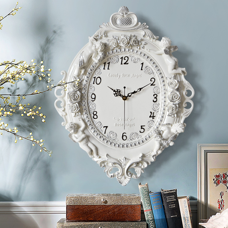 ساعة حائط أوروبية على شكل ملاك - مراجعة Resin Art Wall Clock وسعره