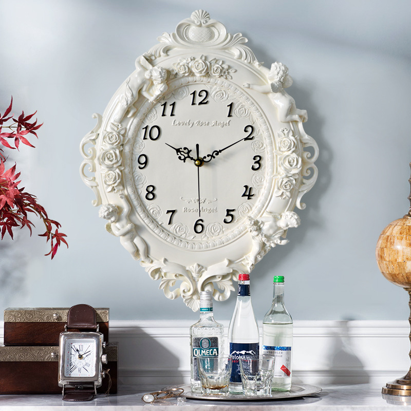 ساعة حائط أوروبية على شكل ملاك - مراجعة Resin Art Wall Clock وسعره